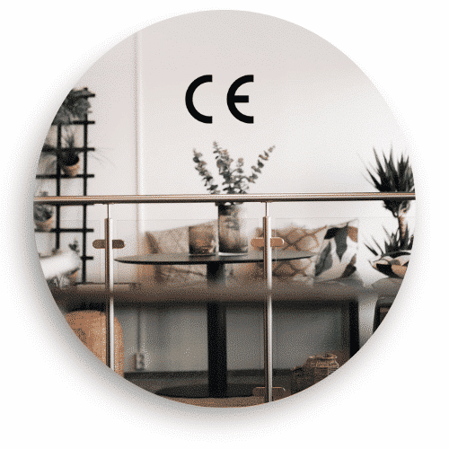 Indoor glass railing with visible CE marking, showing compliance with European safety standards and approved construction quality.